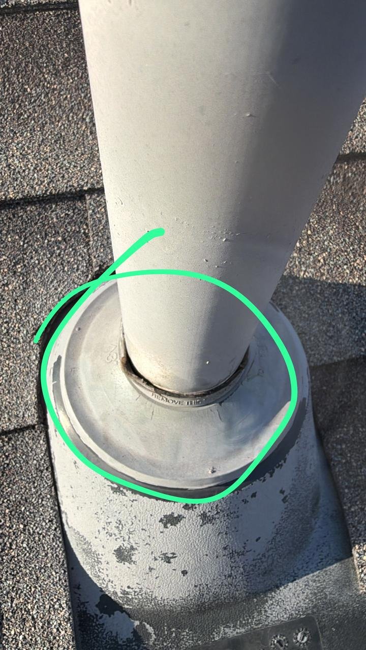 Commercial roof condition before pipe boot repair