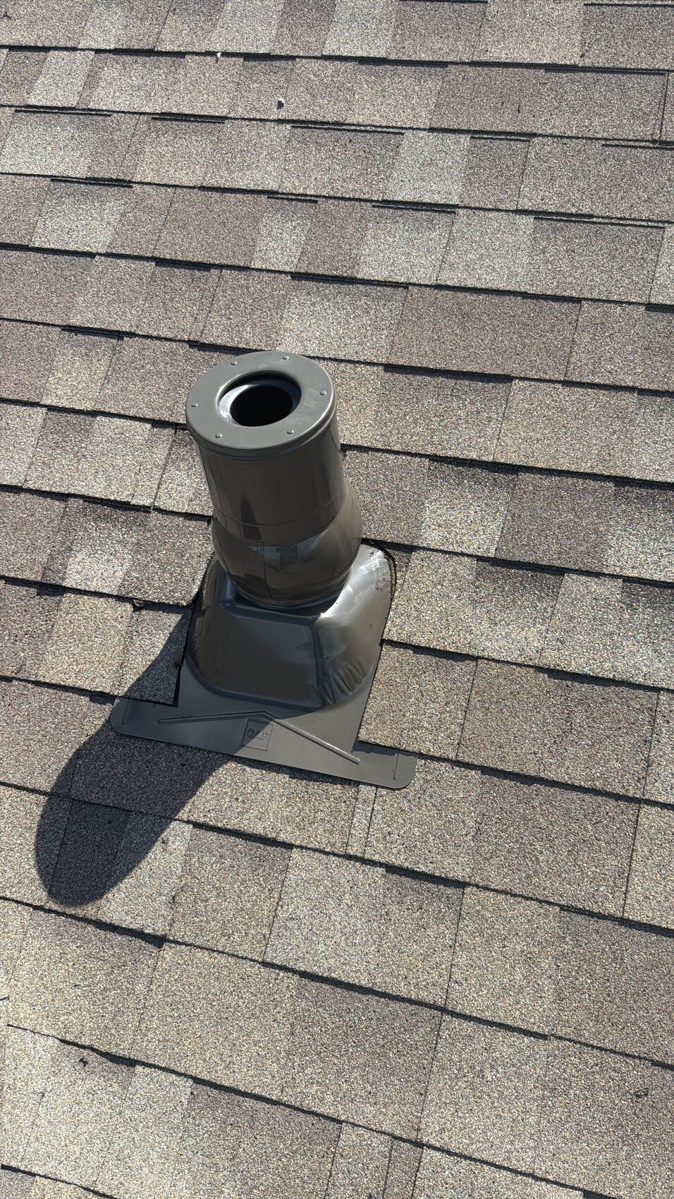 Finished GAF Master Flow Pivot Pipe Boot set into architectural shingles