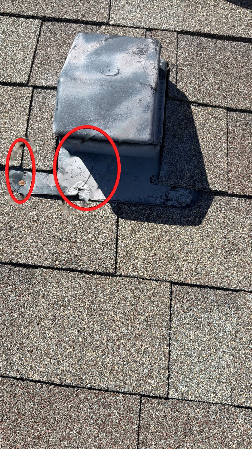 Cracked plastic gooseneck static vent with rusted flange nail highlighted