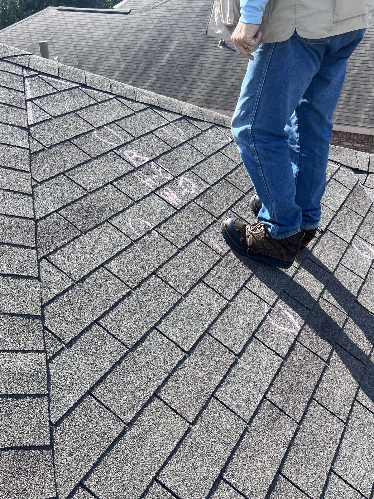 Additional hail chalk marks on shingles